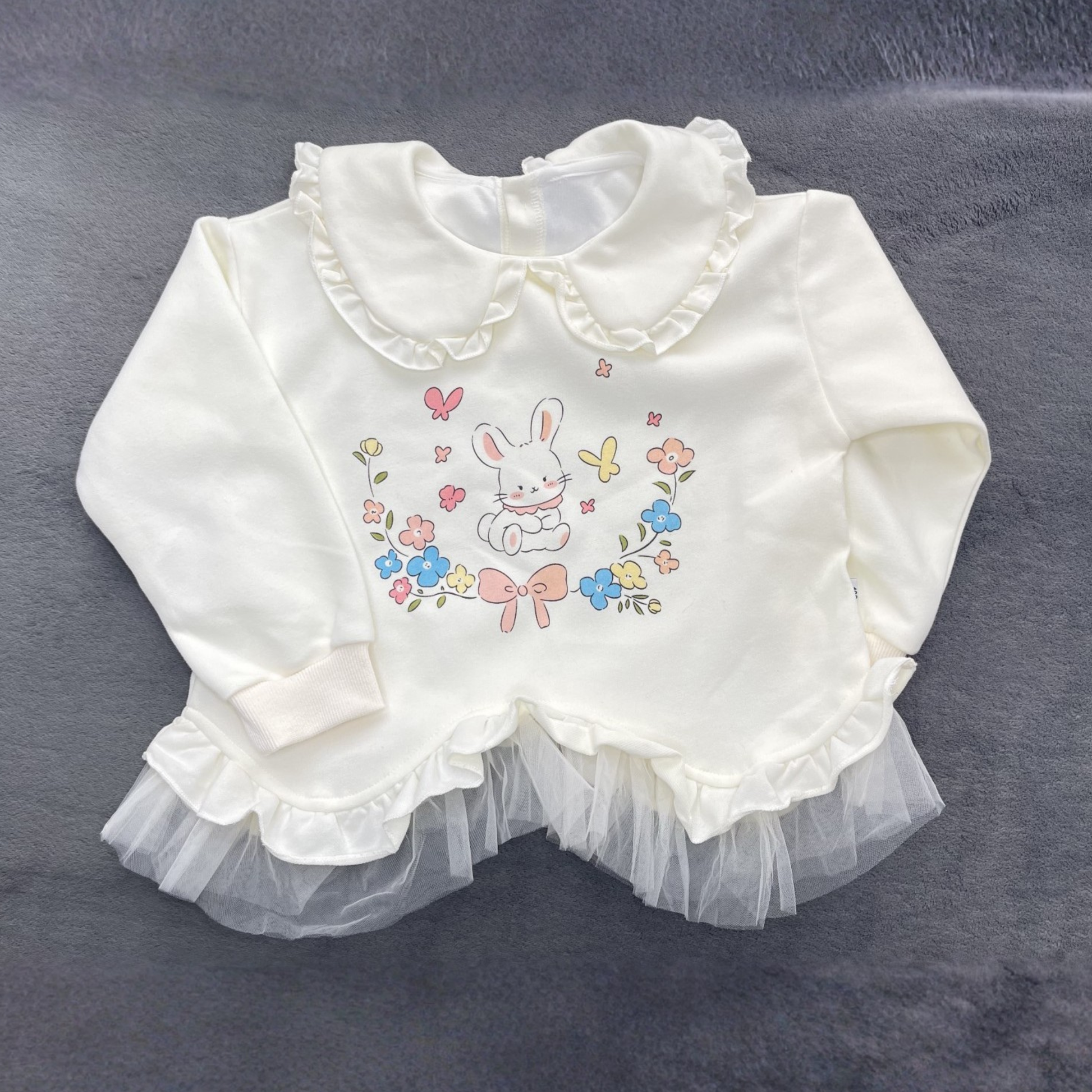 Bunny Frill Sweatshirt in cream and pink with ruffle collar, layered hem, and cute bunny graphic print — CHÉRUBI Kidswear.